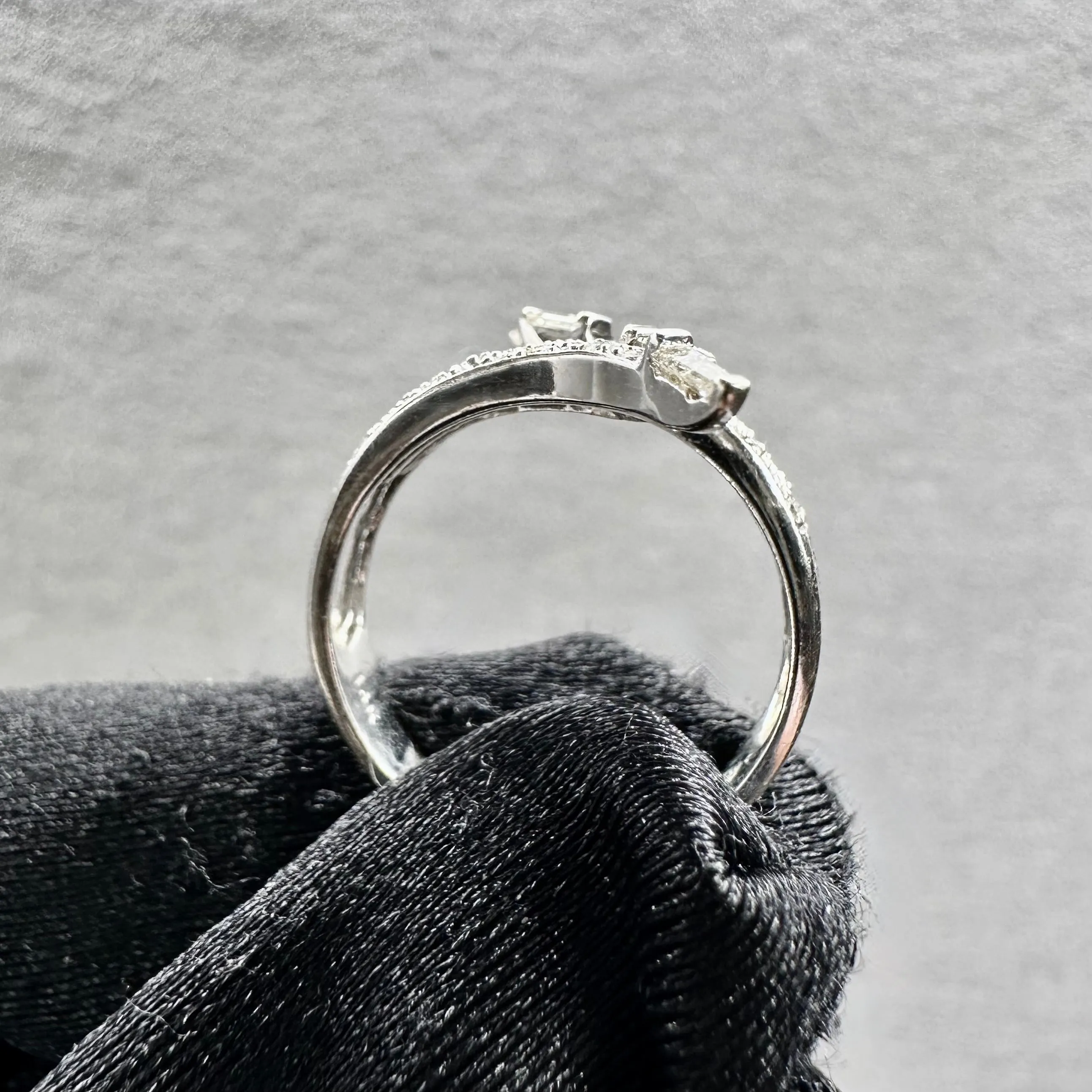 18KT White Gold Tapered Baguette and Round Diamond Ring