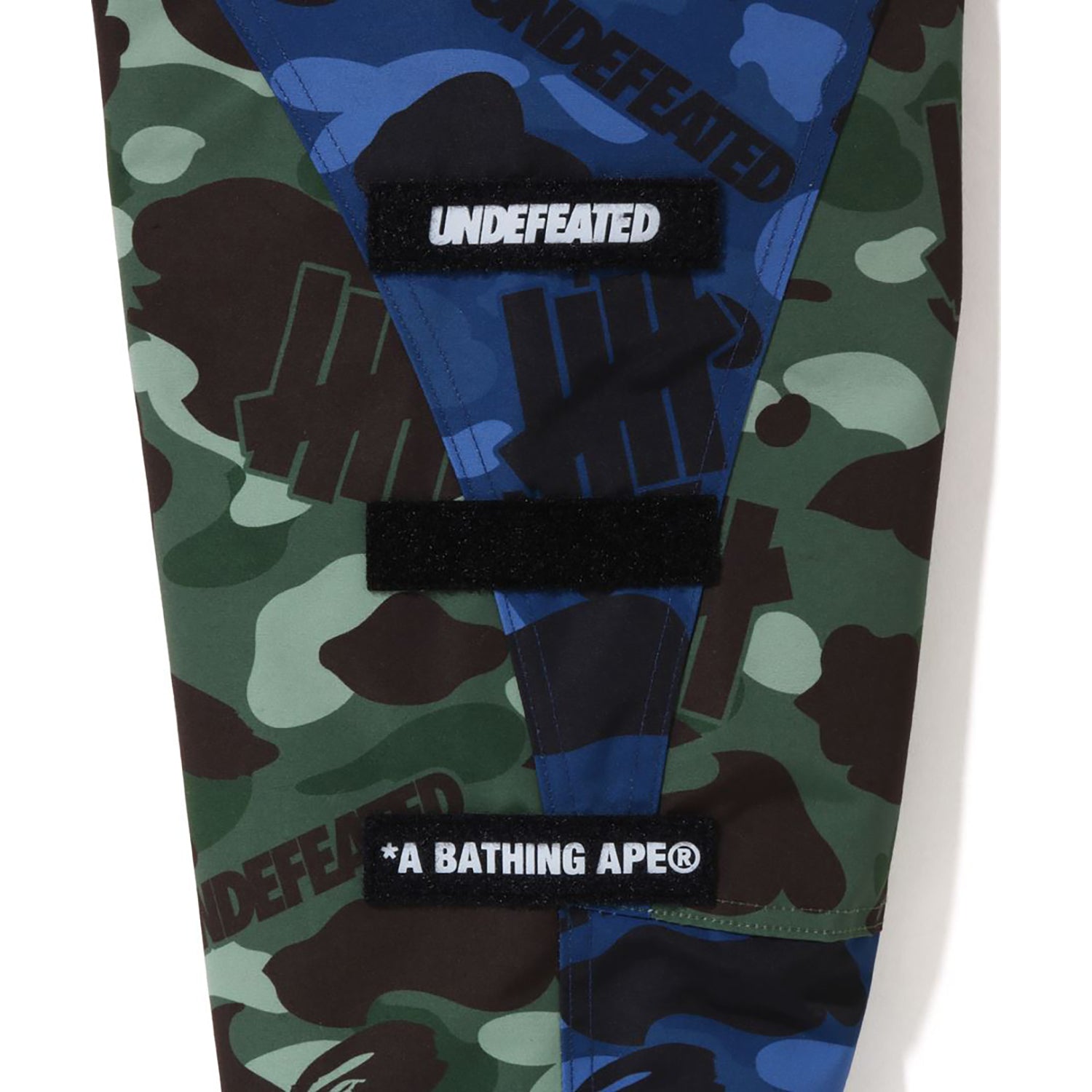 BAPE X UNDEFEATED COLOR CAMO SNOWBOARD DOWN JACKET MENS